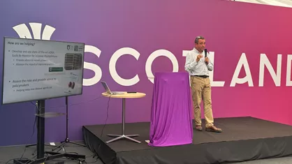 John Jones speaks at launch event.